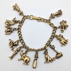 Vintage Walt Disney Productions Jungle Book Gold Tone 12-Charm Bracelet 7in